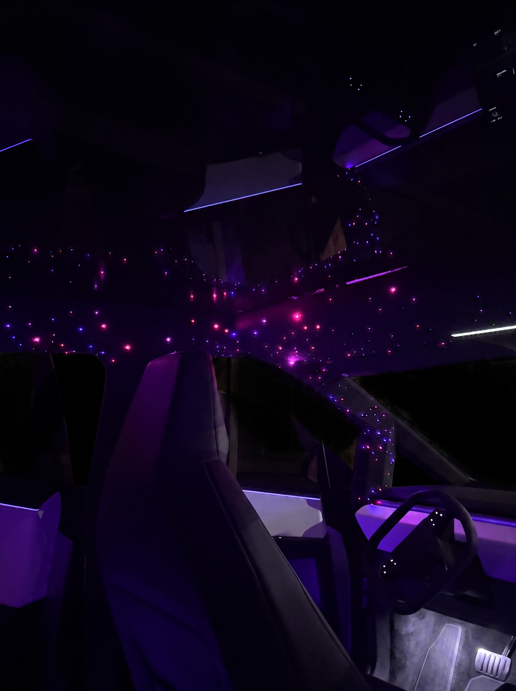 Cybertruck starlight roof set to purple and pink